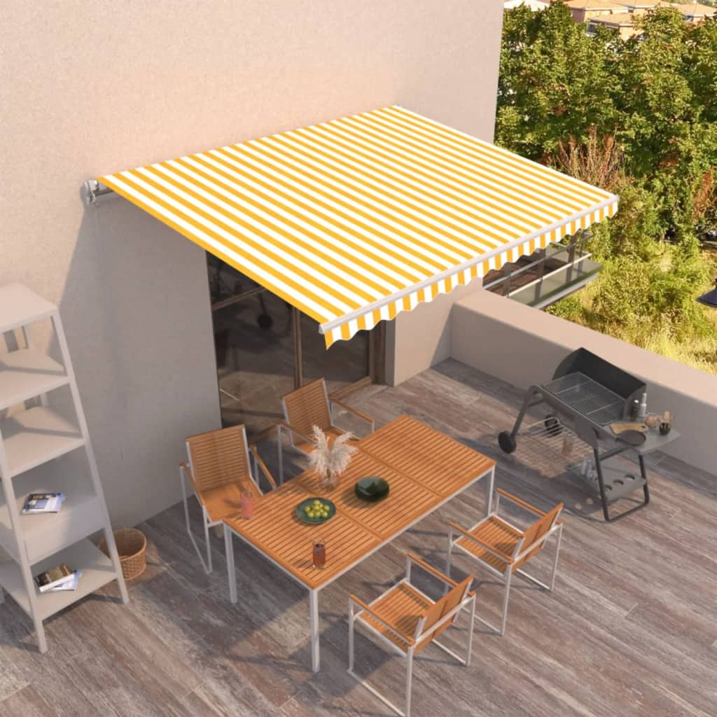 Toldo retráctil manual amarillo y blanco 350x250 cm