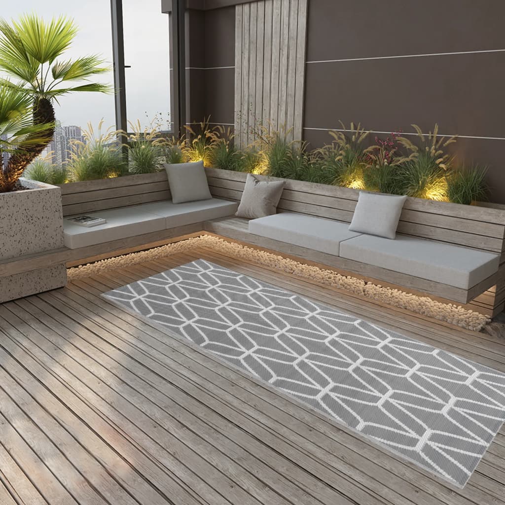 Alfombra de exterior ARAKIL amarilla 140x200 cm PP