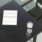Mesa de comedor de jardín acero y vidrio negra 140x70x74 cm