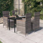 Comedor de jardín 5 pzas ratán sintético y madera acacia negro