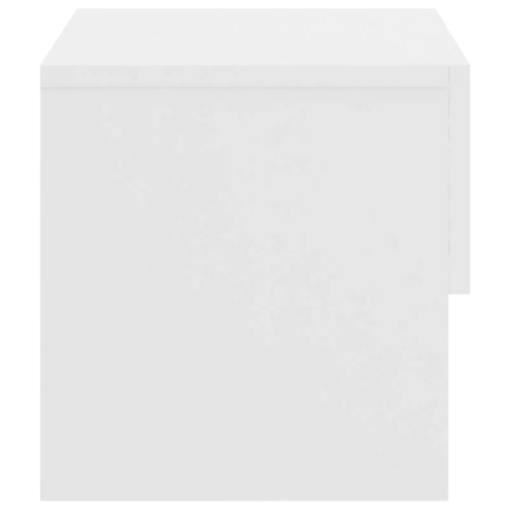 Mesita de noche de pared blanca
