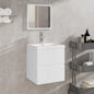 White vanity with sink and mirror