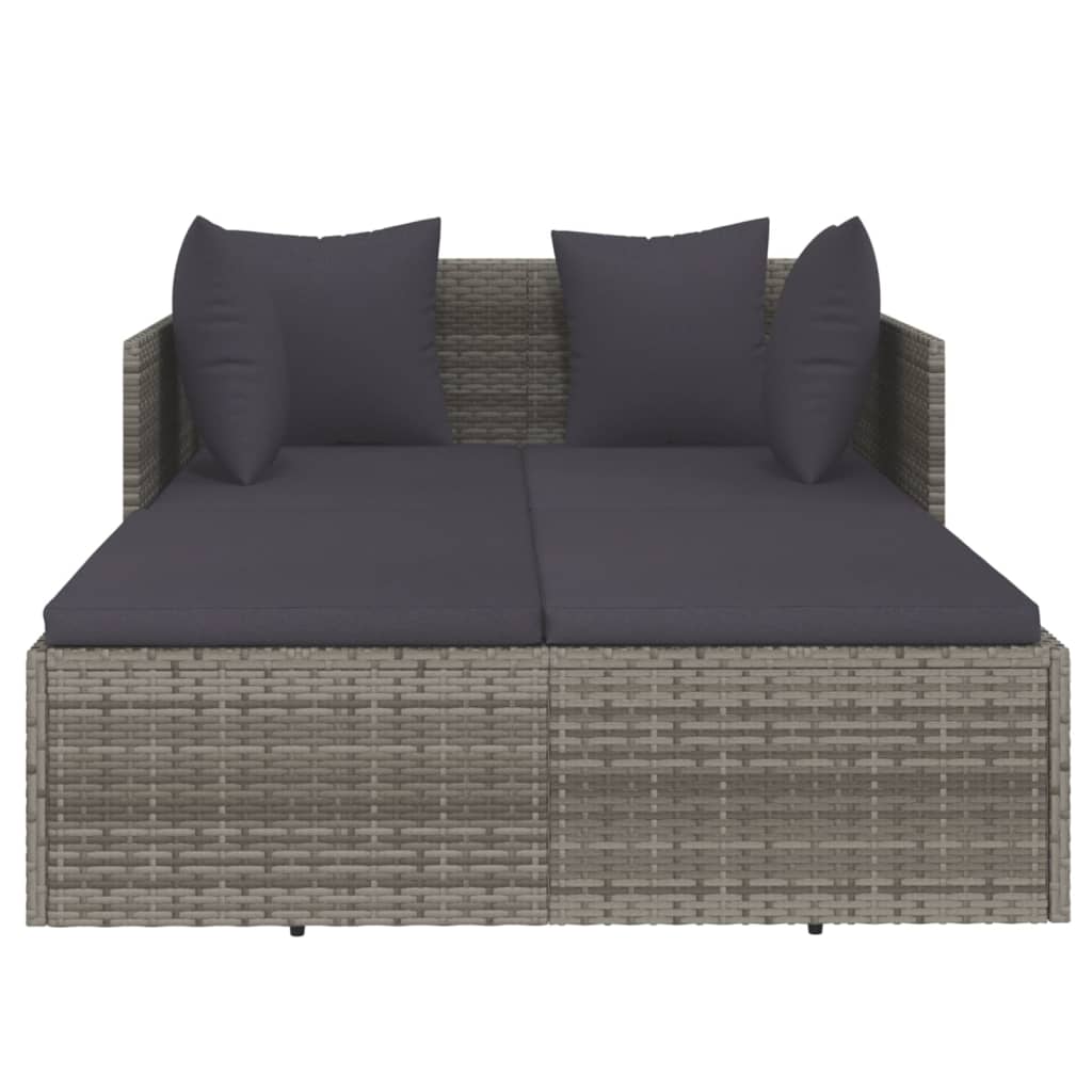 Tumbona con cojines ratán sintético gris 182x118x63 cm