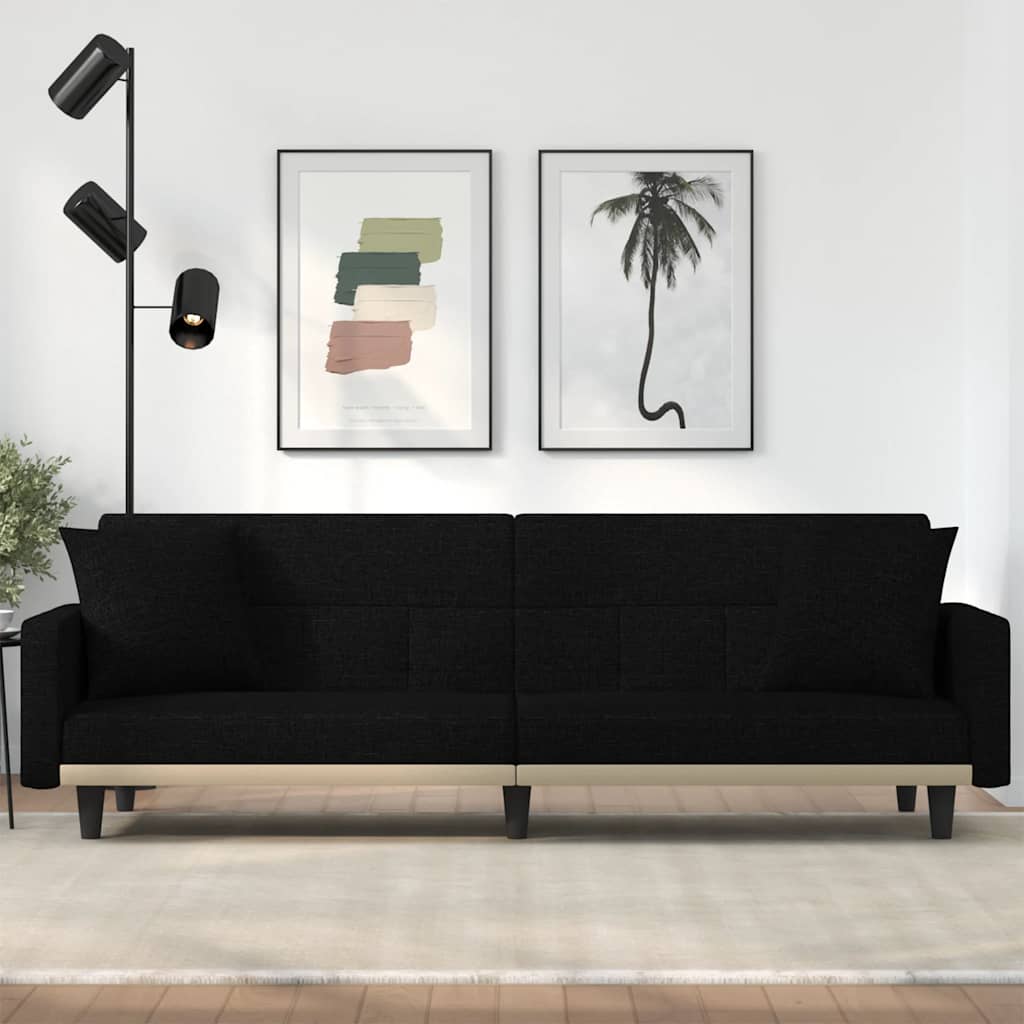 Sofa bed with light yellow fabric cushions