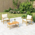 Sillas de jardín 2 uds bambú con cojines blanco crema