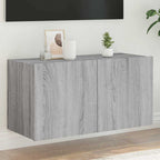 Mueble de pared TV con luces LED gris hormigón 140x31x38 cm