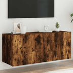 Mueble de pared TV con luces LED gris hormigón 140x31x38 cm