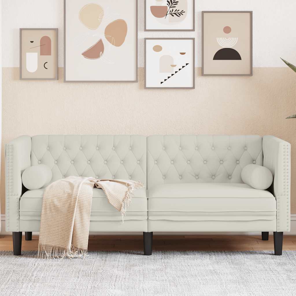 2-seater Chesterfield sofa with yellow velvet cushions