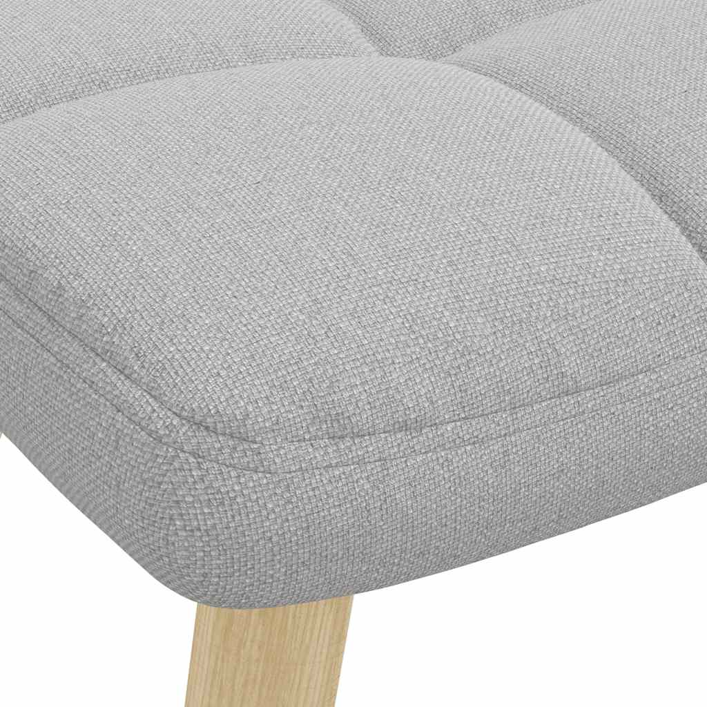 Mecedora con reposapiés de tela gris nube