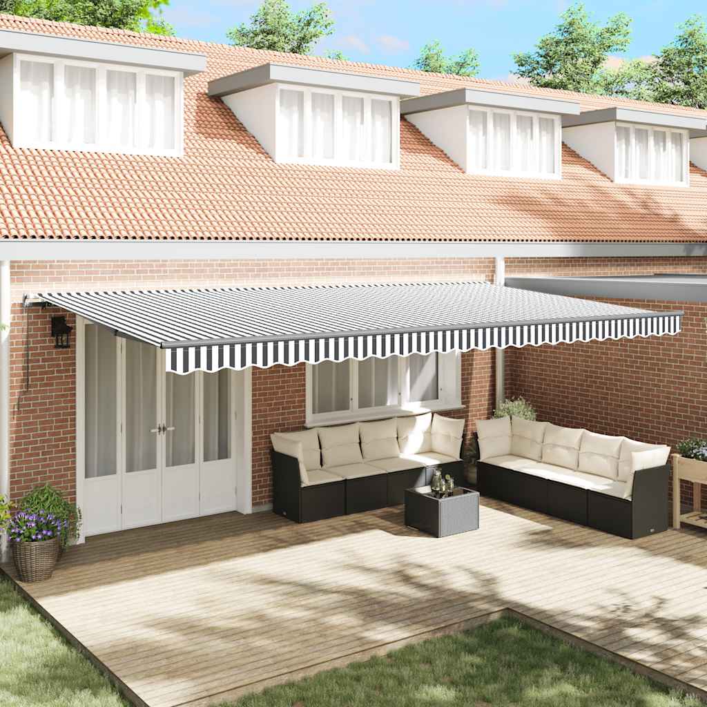 Toldo retráctil manual antracita y blanco 600x300cm