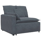 Sofá modular con reposapiés y cojines gris oscuro