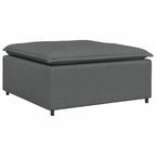 Sofá modular con reposapiés y cojines de tela gris oscuro
