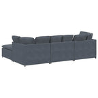 Sofá modular con reposapiés y cojines en terciopelo gris oscuro