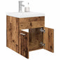 Old wood sink cabinet with built-in basin and faucet