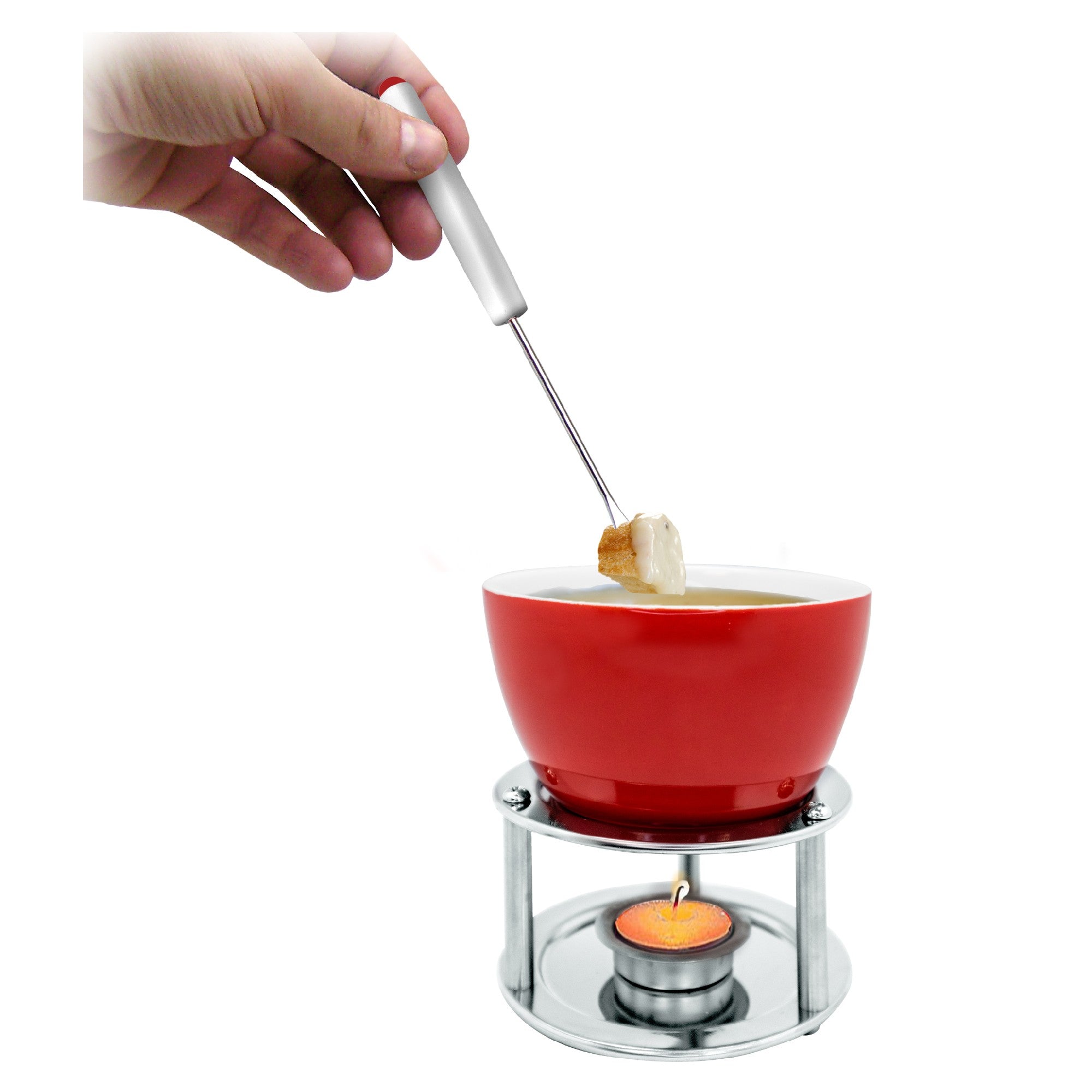 Ceramic fondue with skewers and candle