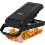 Manual vegetable chopper with interchangeable blades