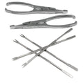 Conjunto de utensílios para marisco com pinças e espetos.