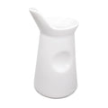 White porcelain milk jug for coffee or tea