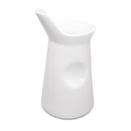 White porcelain milk jug for coffee or tea