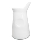 White porcelain milk jug for coffee or tea