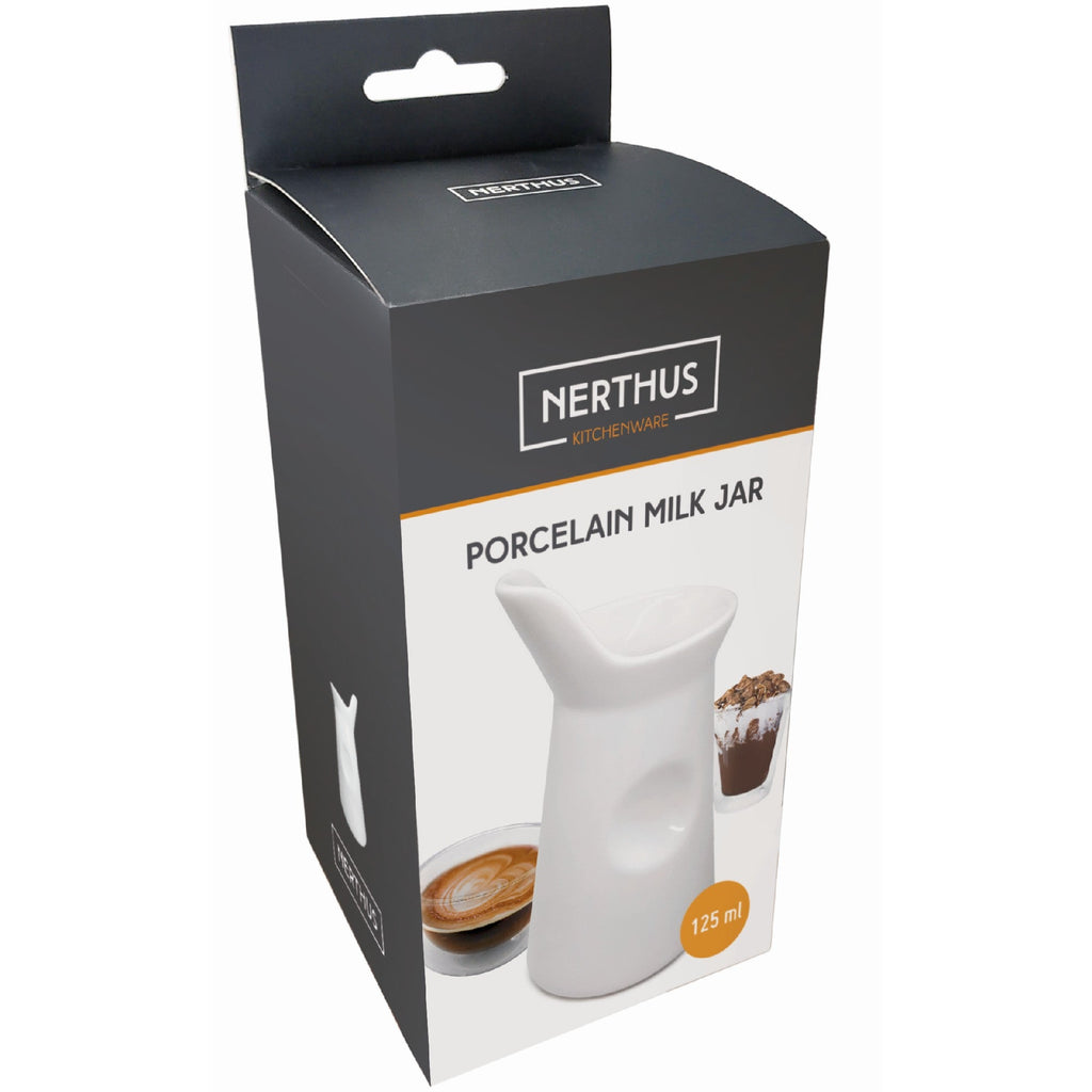 White porcelain milk jug for coffee or tea