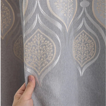 Thick, printed window curtains in gray and toffee