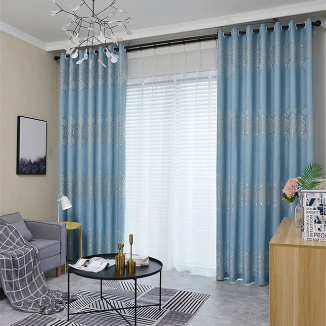 Thick, printed window curtains in blue or pink