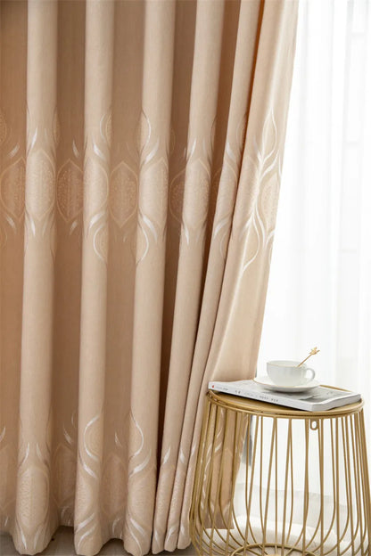 Thick, printed window curtains in gray and toffee