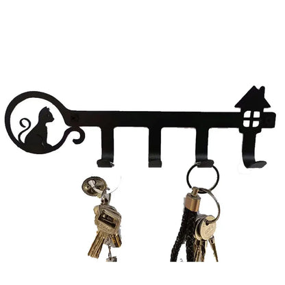 Black metal key holder for wall with cat inspiration design
