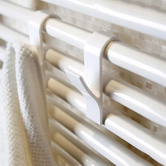 Clip hanger for towel radiator