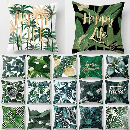 Decorative cushion cover with tropical prints of leaves and plants