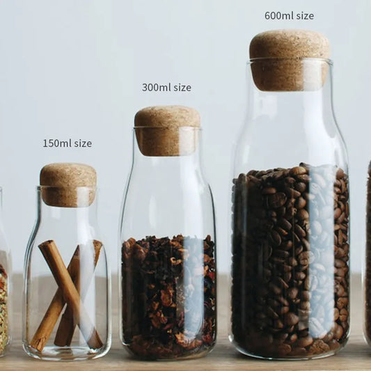 Jar with cork seal in transparent glass for storage of coffee, tea, etc.