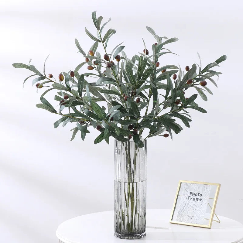 Artificial olive branch with decorative fruits