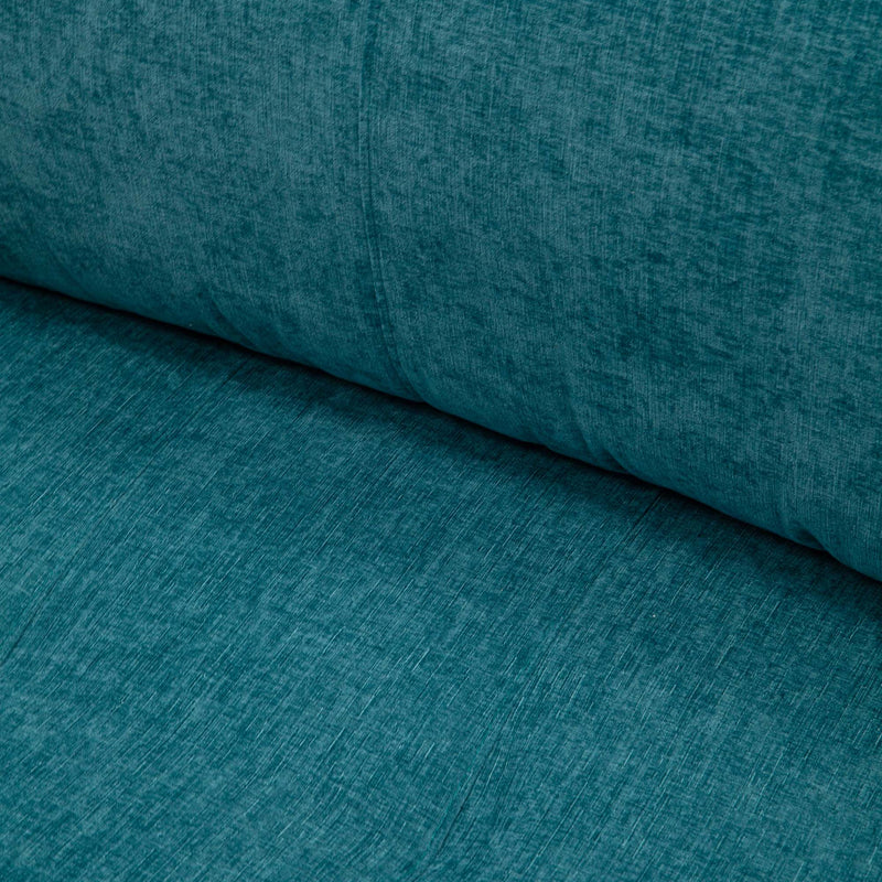 Sofá cama deslizante azul con cojines para visitas