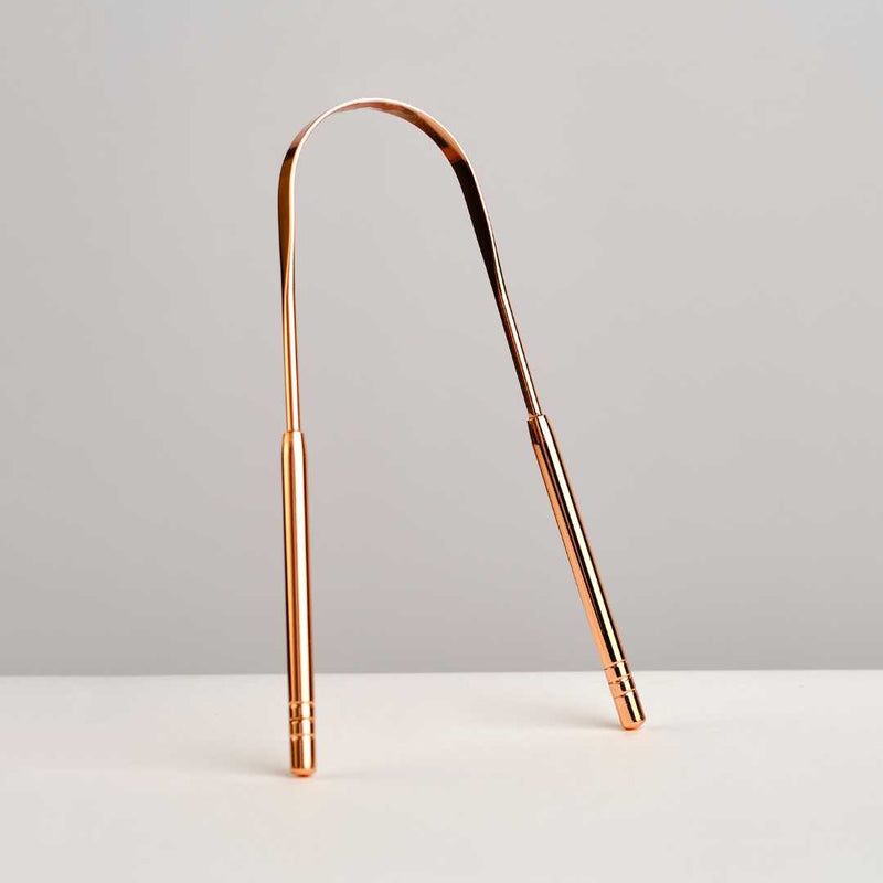 Raspador lingual para higiene bucal diaria en casa