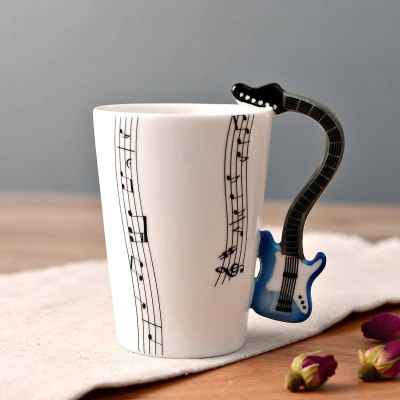Taza de Cerámica 250ml con Notas Musicales y Asa en Forma de InstrumentoTazasHome & Garden > Kitchen & Dining > Tableware > Drinkware > Coffee & Tea Cups