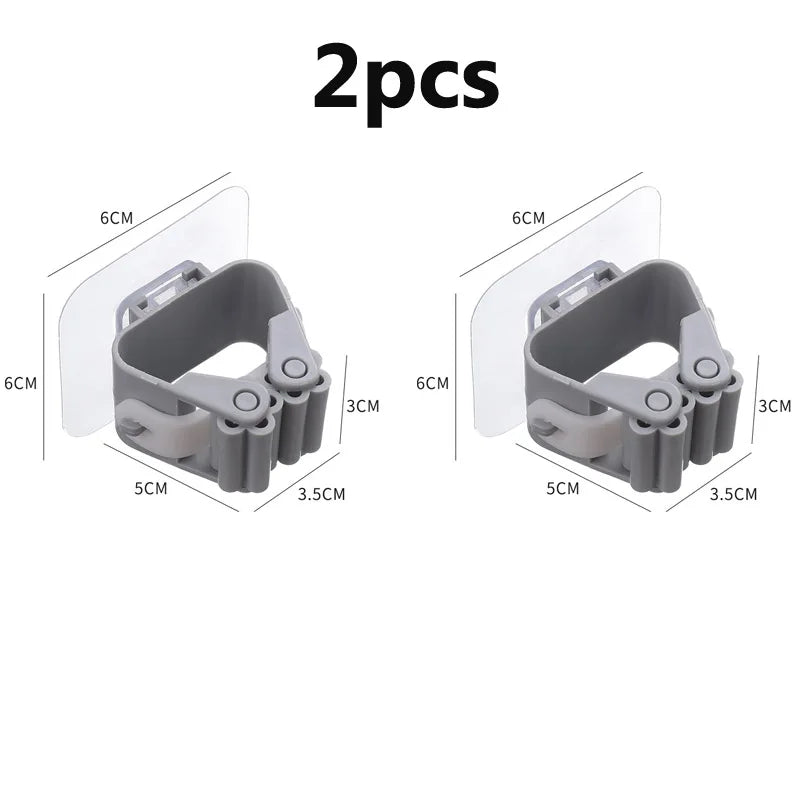 Soporte de pared de clip para escobas y fregonas autoadhesivosColgadores