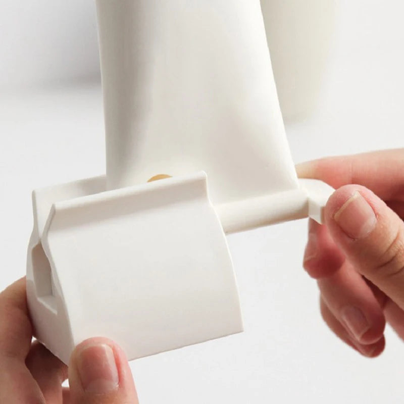 Dispensador exprimidor de pasta de dientesDispensadores pasta de dientes