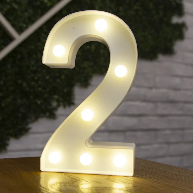 Decorative LED lights in the shape of white letters