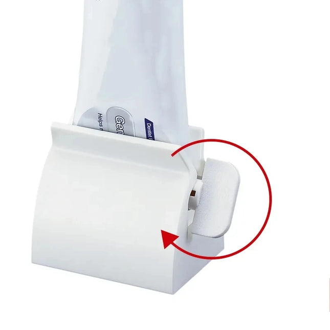 Toothpaste squeezer dispenser