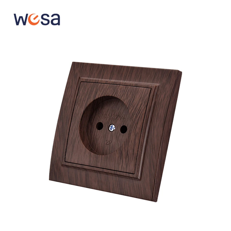 Enchufe empotrable con toma de tierra y acabado efecto madera en marrón. Plástico ignífugo, estándar UEEnchufesHardware > Power & Electrical Supplies > Power Outlets & Sockets > Wall Outlets