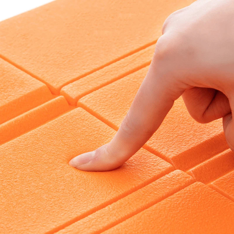 Almohadilla de asiento plegable e impermeable para el aire libreAsientos plegables