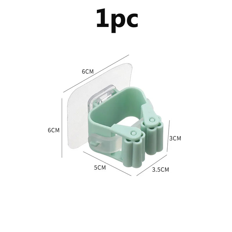 Soporte de pared de clip para escobas y fregonas autoadhesivosColgadores