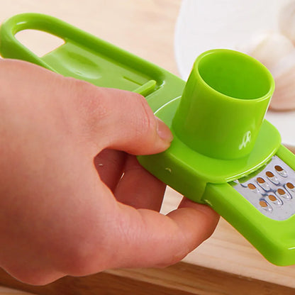 Multifunctional garlic crusher