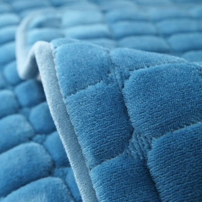 Individual plush sofa covers in shades of blue and gray