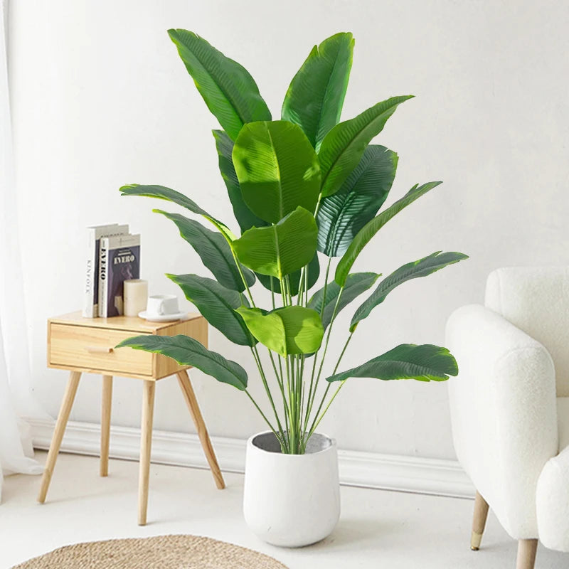 Planta artificial tropical 65-88 cm con hojas de palma y monstera para interior o exteriorPlantas artificialesHome & Garden > Decor > Artificial Flora > Artificial Non-Flowering Plants