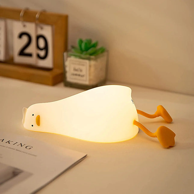 Veilleuse LED en forme de canard couché doux en silicone à intensité variable