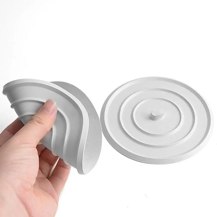 Silicone plug for drains