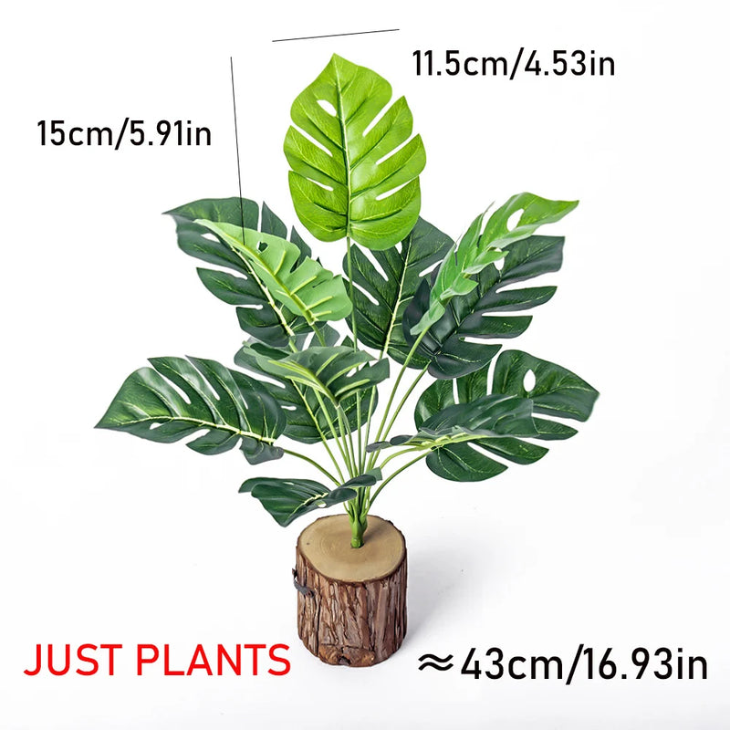 Planta artificial decorativa 43 cm | hojas tropicales realistas con base efecto troncoPlantas artificialesHome & Garden > Decor > Artificial Flora > Artificial Non-Flowering Plants