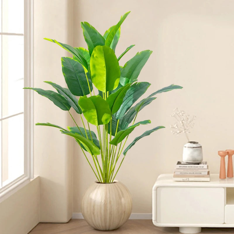 Planta artificial tropical 65-88 cm con hojas de palma y monstera para interior o exteriorPlantas artificialesHome & Garden > Decor > Artificial Flora > Artificial Non-Flowering Plants